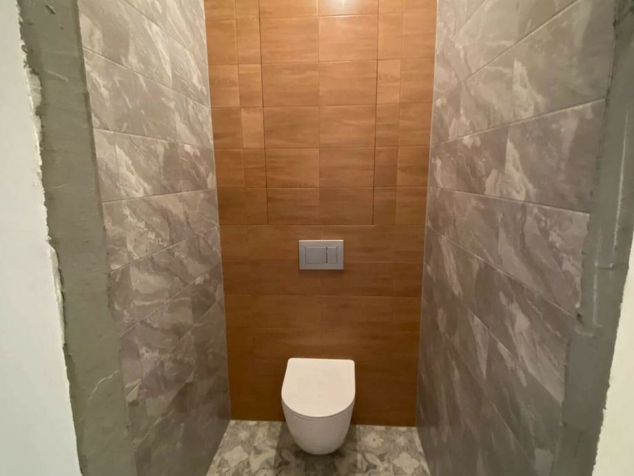 Укладка керамогранита в Санузле на ул. Бассейная   3