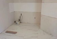 Укладка керамогранита на пол в Янино