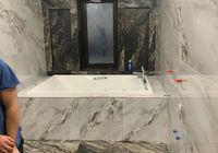 Укладка керамогранита на стены на  коломяжском пр.