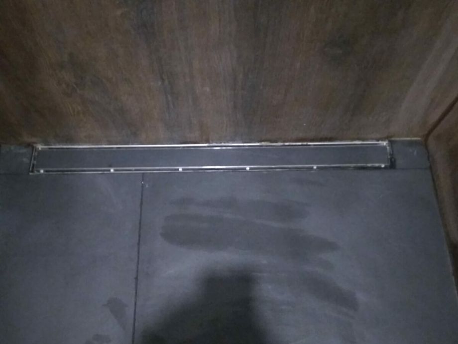 Укладка крупноформатного керамогранита в санузле на ул. Марата 3