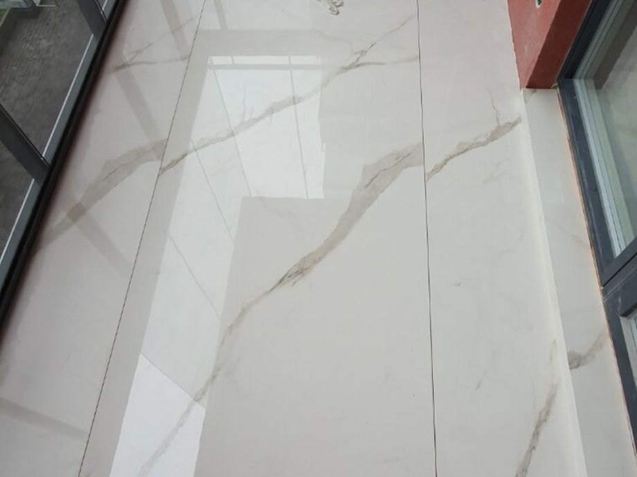 Укладка крупноформатного керамогранита на пол на Аптекарском пр. 5